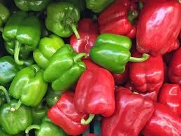 picture of raw red and green bell peppers